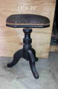 black piano stool